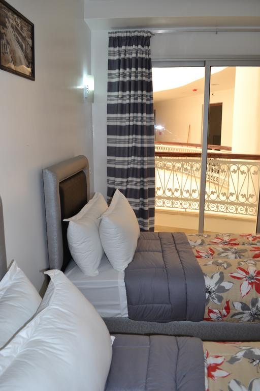 Hotel La Place El Jadida Bagian luar foto